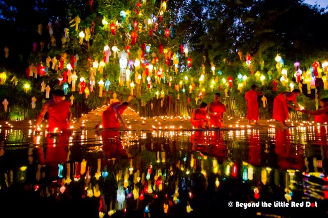 Novice monks go about lighting the oil lamps. There are like more than a hundred lamps. Seeing all of them lighted up gives a magical feel to the whole place.